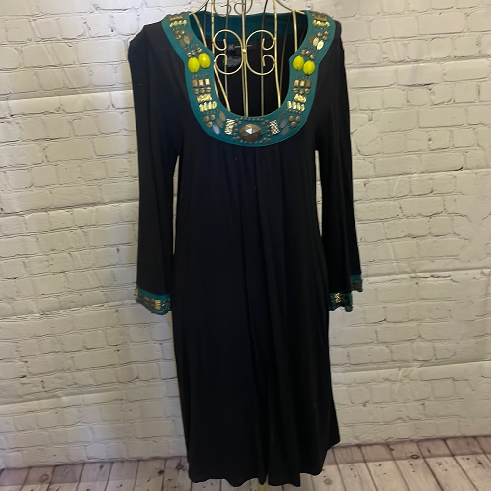 Black swing style With decorative trim in green